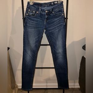 Buckle mid rise Miss Me skinny jeans